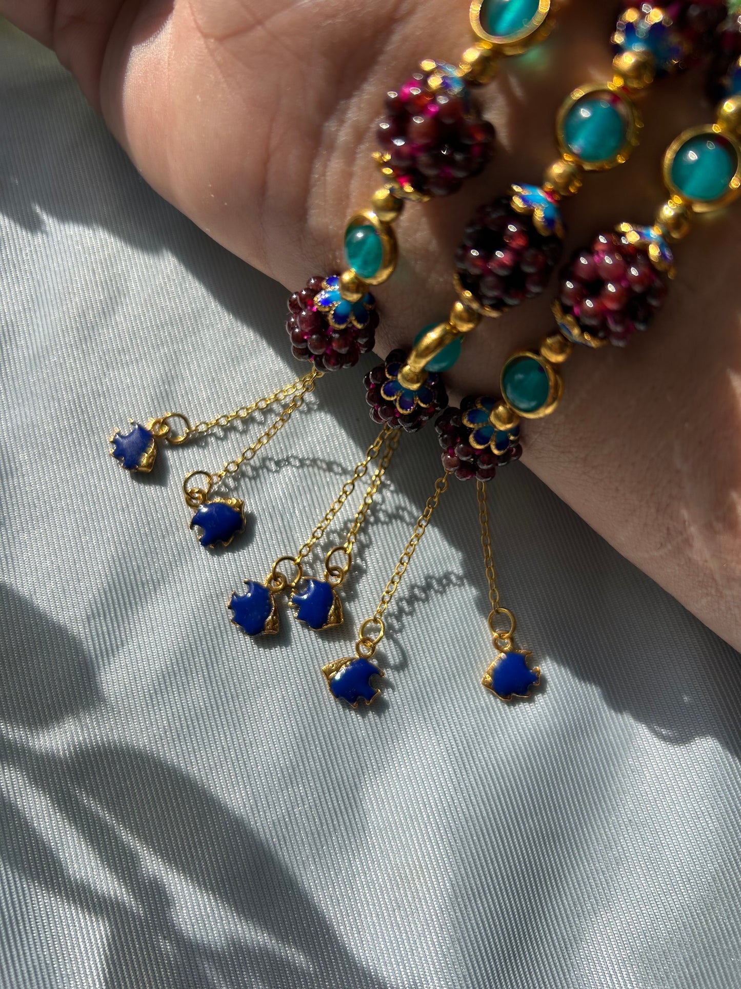 GARNET BERRY BRACELETS + BLUE TANG FISH DETAILS